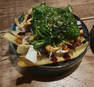 VEGAN DUCK & WAKAME crispy vegan duck, shredded cabbage & wakame salad, firecracker mayo, green chilli & furikake (half rice and chips) at Wolf at the Door in Manchester