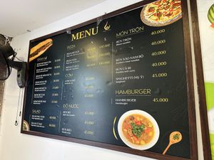 Menu (note that the pizzas are not vegan)  at Bánh mí Vegan Vietnam in Hanoi