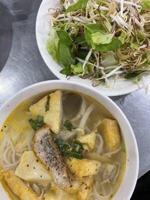 Herbs from neighbours table - I did not get any because I am a tourist   at Hong Nga in Hue