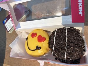 two cream filled donuts  at Dunkin' - Stationsplein in Amsterdam
