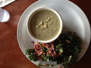 Cup of broccoli soup and small kale salad at Wildflour Bakery and Cafe in West Seattle