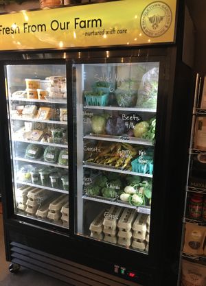 Refrigerated vegetables for sale at Wise Acre in Minneapolis