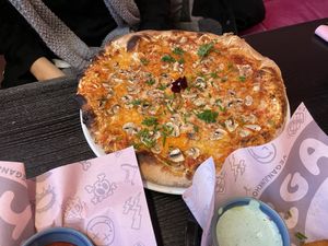 Far out Funghi Pizza at Vegan Junkhouse Club in Munich
