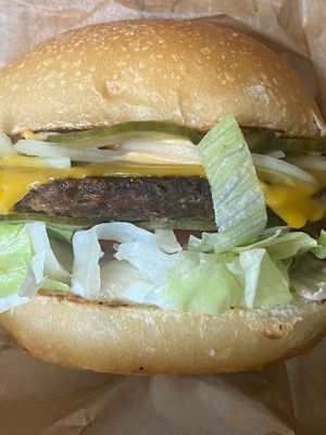 the top burguer with added pickles yummy at Ameaça Vegetal in Lisbon