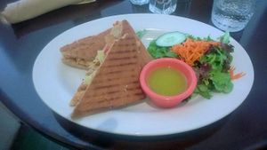 Chipotle Panini & salad with Lemon Vinaigrette dressing at Adama in Santa Barbara