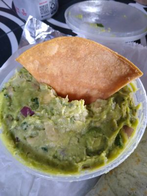 Large amount of guacamole and homemade chips at Funchos in Riverhead