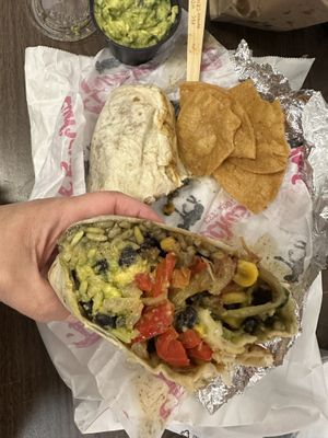 El Vegano combo/platter made into a Burrito with housemade chips and guacamole   at Funchos in Riverhead
