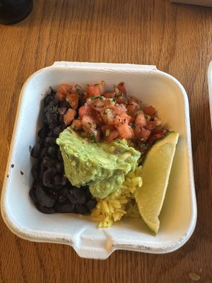 Side of rice and beans with guac and pico de gallo(ordered without crema)  at Funchos in Riverhead