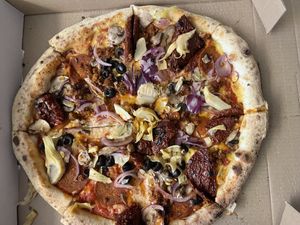 Vegan pepperoni, Tuscan sausage, artichokes, olives, sundried tomatoes, red onions and mushrooms 😍  at Pizza Punks in Leeds