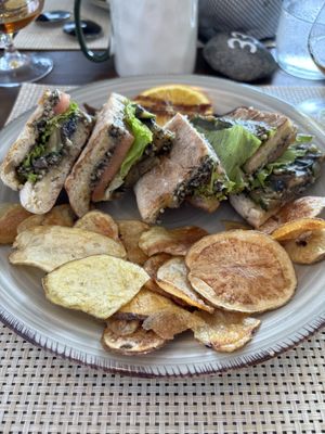 Sandwich contains olive tapenade, almonds, and veggies. On Madeira flatbread. Good portion and really tasty.  at Conchinha in Porto Moniz