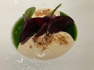 Young beets, ginger, almonds, basil olive oil at Opasly Tom in Warsaw