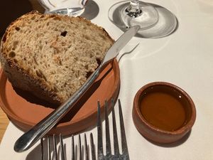 Bread and rapeseed oil at Opasly Tom in Warsaw