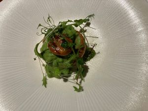 Puff pastry, green peas, smoked tofu at Opasly Tom in Warsaw