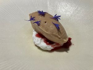 Vegan cottage cheese, rose ice cream, rose petals in syrup at Opasly Tom in Warsaw