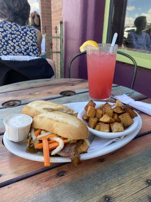 Bahn Mi (with seitan), fried garlic potatoes, side of ranch & fresh squeezed raspberry lemonade at Sweet Melissa Cafe in Laramie