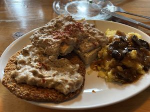 Impossible chicken fried steak, mashed potatoes with mushroom gravy and biscuits and gravy   at Sweet Melissa Cafe in Laramie