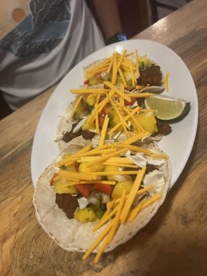 Mole tacos… swapped out some “egg-based chicken” for cauli and it was good!   at Sweet Melissa Cafe in Laramie