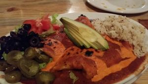 enchilada platter with vegan cashew cheese and avocado instead of sour cream at Sweet Melissa Cafe in Laramie