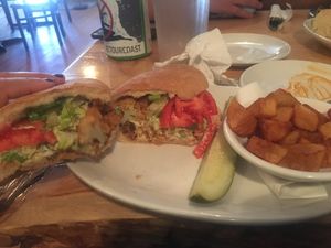 Cauliflower sandwich with garlic roasted potatoes. Yum! at Sweet Melissa Cafe in Laramie