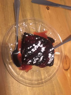 Vegan chocolate cake with raspberry sauce   at Sweet Melissa Cafe in Laramie