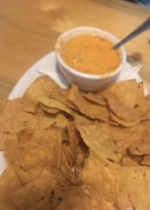 Delicious cashew queso with warm chips...so good.  at Sweet Melissa Cafe in Laramie