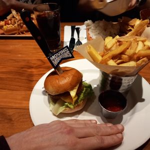 I don't have a giant hand, it's a tiny burger. at Hard Rock Cafe in Newcastle Upon Tyne