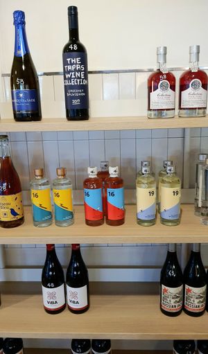 Display of bottled liquor at Jigushop - Sangdo 지구샵 상도점 in Seoul