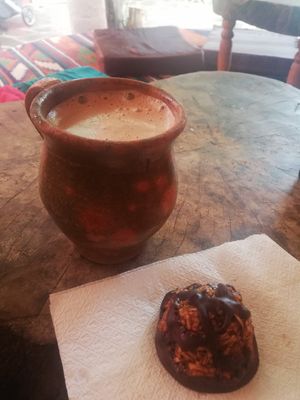 Cacao-coffee and Coco macaroon. Yum! at The Emporium in San Marcos La Laguna