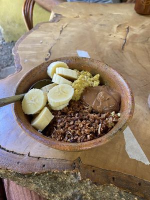 Golden Porridge (creamy homemade macadamia butter & choco coco Granola)  at The Emporium in San Marcos La Laguna