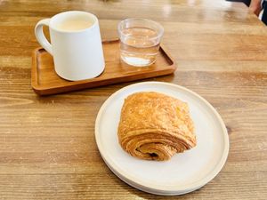 Chai latte and pain au chocolat  at Gecko Coffeehouse in East London