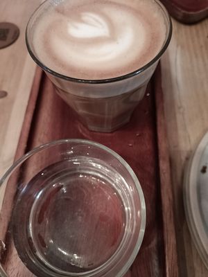 Coffee and glass of water that came with it at Gecko Coffeehouse in East London