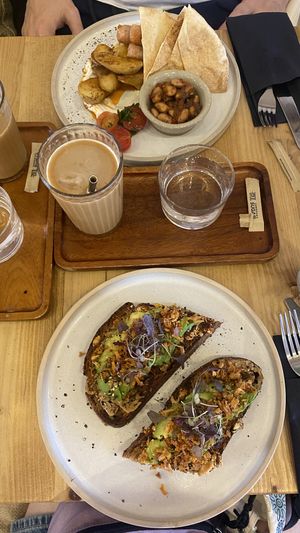 Gecko breakfast, avocado toast, 2 lattes  at Gecko Coffeehouse in East London