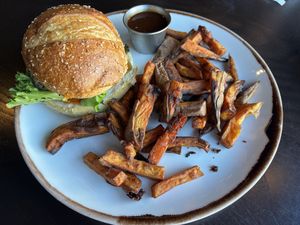 Veg burger with sweet potato fries   at RED LENTIL in Sharon