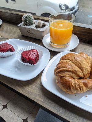 croissant, mini cakes (for Valentine's day) and orange juice at Pasiones Bar  in Gijon