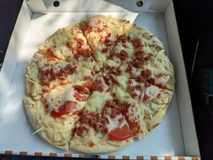 Delicious pizza at Pasiones Bar  in Gijon