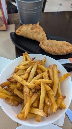 Alioli fries & empanadas at Pasiones Bar  in Gijon