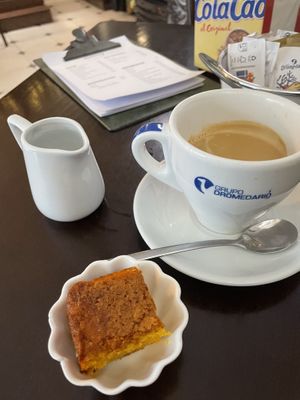 Café americano with carrot cake  at Pasiones Bar  in Gijon