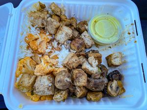 Mahana bowl with garlic tofu, Buffalo cauliflower, roasted mushrooms and a coconut sweet potato sauce. Light and flavorful!  at Mahana Fresh in Idaho Falls