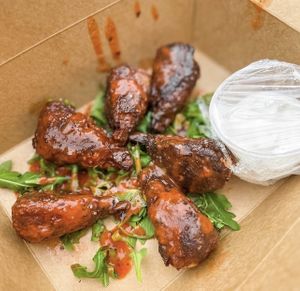 Vegan Buffalo wings?! So crazy, so delicious! Got some ranch for the side, blue cheese also available. Bone is made out of sugarcane and completely edible  at Bread + Roses in Hyannis