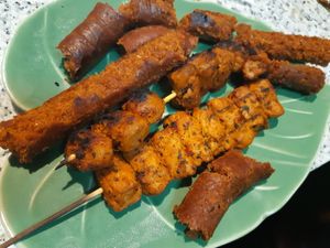 Chorizo, meat brochettes and black sausage at Vegreat in Valencia