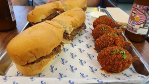 Pastrami sandwich and wings. at Jimmy's Street Food in Paris