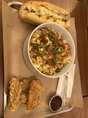 Sub sandwich (our favourite thing on the menu) loaded Mac and cheese, and chicken tenders   at Jimmy's Street Food in Paris