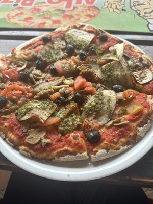  Vegetarian pizza, no cheese, added olives and eggplant  at Allo Pizza in Moorea
