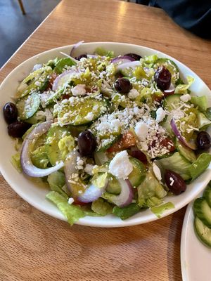 Mushroom Shawarma Feast For Two includes marinated and grilled shawarma tower (portobello mushrooms), Greek rice, salad, steamed veggies, tzatziki, hummus, pita  at Graze Kitchen  in Las Vegas
