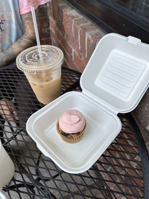 Iced oat vanilla cardamom latte and strawberry cupcake  at Dulce Vegan Bakery and Cafe in Atlanta