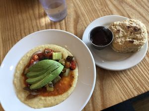 Veggie grits and a biscuit  at Dulce Vegan Bakery and Cafe in Atlanta