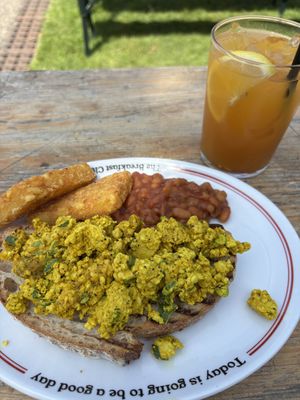Plant based scrambled tofu with beans and hash browns  at The Breakfast Club in East London