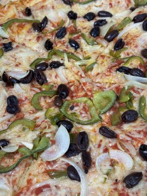 Custom pizza with light vegan cheese  at MONDO in Middletown