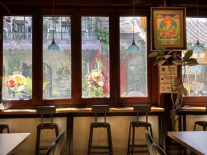 Can sit and eat while watching people walk by  at Chīsù De - Veggie Table in Beijing