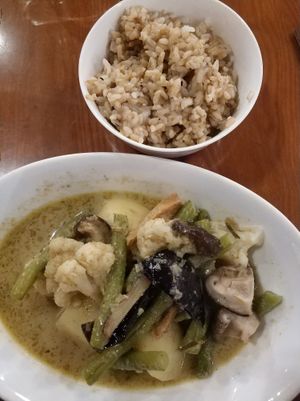 Thai dish with tofu and a bowl of rice. at Chīsù De - Veggie Table in Beijing